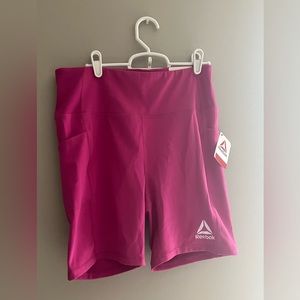 Large Reebok Fitted High Rise Shorts in Hot Pink